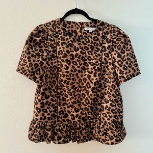 Leopard print short sleeved peplum blouse M